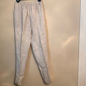 Tan elastic waisted pants.